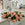 Bouquet of peach roses on a kitchen counter with a modern interior background