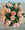 Bouquet of peach-colored roses on a textured surface